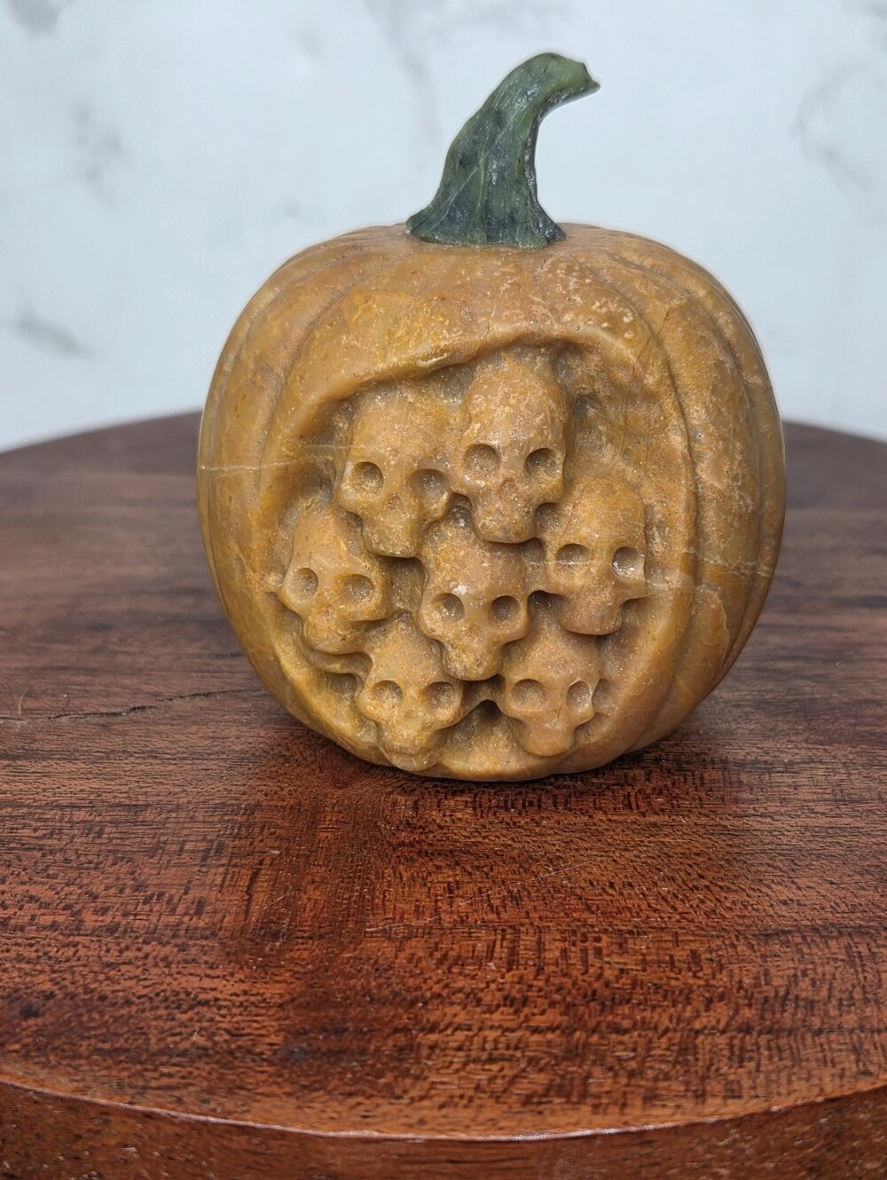 Orange Calcite And Green Aventurine Pumpkin With Skulls 3.4 In